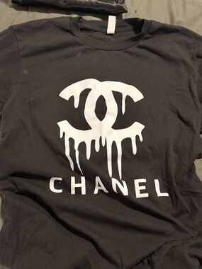 CHANEL Black T-Shirt with White Drip Logo